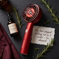 Red hairbrush with Bellora scalp serum 